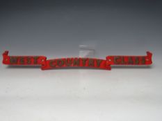 A CAST BRASS REPLICA LOCOMOTIVE RIBBONED NAME PLATE 'WEST COUNTRY CLASS', W 72 cm