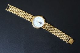 A CONTINENTAL DAY MONTH BULOVA MOON PHASE QUARTZ WRIST WATCH, Dia 3.5 cmCondition Report:working