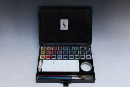 A BLACK METAL ARTISTS BOX BY REEVES, with contents, W 24 cm