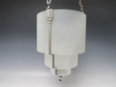 AN ART DECO THREE STAGE GRADUATED CHROME AND GLASS CEILING SHADE
