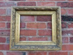 A 19TH CENTURY GOLD FRAME WITH THISTLE DESIGN, frame W 9 cm, rebate 40 x 32 cm