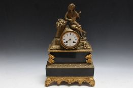 A FRENCH ORMULU STYLE CLOCK BY LARZET, decorated with a figure of a grape picker resting and playing