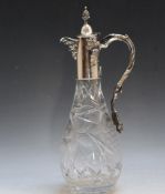 A SILVER PLATE AND CUT GLASS CLARET JUG, H 33.5 cm