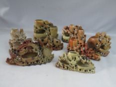 A COLLECTION OF EIGHT ASSORTED ORIENTAL SOAPSTONE CARVINGS, tallest H 18 cm, widest W 30 cm, some