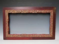 A 19TH CENTURY ORIENTAL WOODEN FRAME, with decorative gold inner, frame W 9 cm, rebate 70 x 40 cm