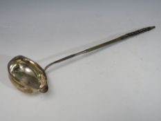 A GEORGIAN HALLMARKED SILVER LADLE WITH EBONISED HANDLE