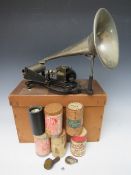 A BOXED PUCK CYLINDER PHONOGRAPH WITH A SELECTION OF WAX CYLINDERS, the cast iron lyre shaped base