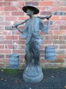 AN UNUSUAL BRONZE STYLE ORIENTAL WATER CARRIER FIGURE, in traditional robes, carrying two pails, H
