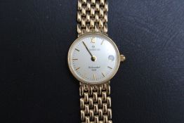 A 9 CARAT GOLD SOVEREIGN DATE WRIST WATCH, approx weight 17g, Dia 2 cm