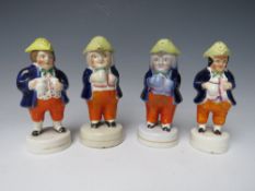 FOUR 19TH CENTURY PEARLWARE FIGURATIVE PEPPER POTS, average H 15 cm