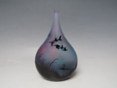 AN ED BURKE E & M STUDIO GLASS SCENIC VASE, black cased, being acid etched to reveal a blue and
