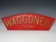 AN ARCHED WOODEN LOCOMOTIVE FOUNDRY CASTING MOULD NAME PLATE 'WAGGONER', painted red and gold, the
