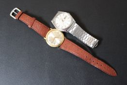 A VINTAGE SEIKO WRIST WATCH, together with a Seiko day date example (2)Condition Report:working