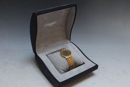 LONGINES - A CLASSIC DATE WRIST WATCH, on gold plated bracelet with spare link and original box, Dia