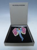 A VINTAGE BUTLER AND WILSON ELEPHANT BROOCH, with reticulated trunk, W 7.5 cm, H 7.5 cm, logo to