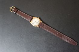 A VINTAGE 9 CT GOLD WRIST WATCH, on replacement leather strap, Dia 3 cmCondition Report: