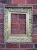 A 19TH CENTURY GOLD FRAME WITH INNER LEAF DESIGN, acanthus leaf design to outer edge and gold