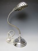 AN ART DECO CHROME SHELL ADJUSTABLE DESK LAMP, impressed to the base G E C