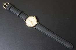 A 9CT GOLD SMITHS DE LUXE WRIST WATCH, with original box and presentation engraving to reverse,