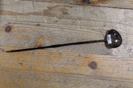 A HALLMARKED SILVER GEORGIAN WHALE BONE TODDY LADLE = HALLMARKS INDISTINCT