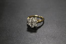 A HALLMARKED 18CT GOLD SEVEN STONE DIAMOND RING SET WITH AN ESTIMATED 1.6 CARATS OF DIAMONDS, APPROX