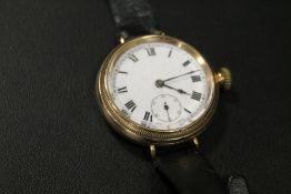 AN ANTIQUE MANUAL WIND WRISTWATCH - PROBABLY IN A GOLD CASE