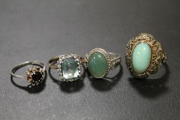 FOUR ASSORTED DRESS RINGS TO INCLUDE SILVER EXAMPLES