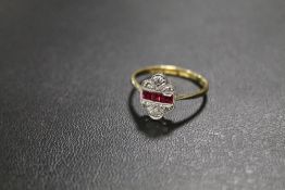 A HALLMARKED 18CT GOLD DIAMOND SET RING WITH PINK STONES - APPROX WEIGHT 2.2 G