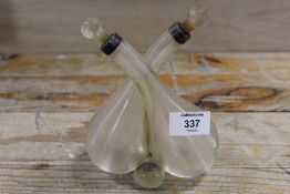 A HALLMARKED COLLARED TWIN OIL BOTTLE WITH MATCH STRIKER STYLE EXTERIOR