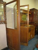 A LARGE OAK AND GLAZED THREE FOLD SCREEN WITH BRASS MOUNTS H-199 W-144 CM