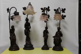 FOUR BRONZE EFFECT FIGURAL TABLE LAMPS