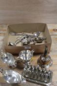 A SMALL TRAY OF ASSORTED SILVER PLATED WARE TO INC A WINE FUNNEL