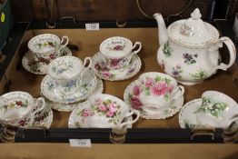 A TRAY OF ROYAL ALBERT FLOWERS OF THE MONTH TO INCLUDE A TEAPOT - MARKED AS SECONDS