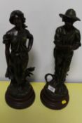 A PAIR OF LARGE FIGURATIVE SPELTER / BRONZE EFFECT STATUES OF PEASANT FARMERS