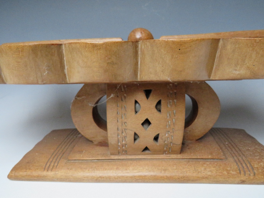 AN AFRICAN TRIBAL ASHANTI 'MANCALA' BEAD GAME BOARD, on a raised stand with pierced decoration, W 68 - Image 2 of 6