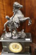 A SLATE MANTLE CLOCK WITH MARLEY HORSE SURMOUNT
