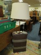 AN UNUSUAL MODERN SUITCASE / LAMP STAND