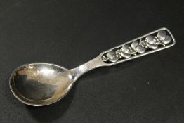 A DANISH COPENHAGEN MARKED SPOON WITH PIERCED FLORAL STEM STAMPED SCF