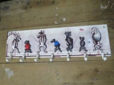 ***A CAST METAL DOGS CUP HANGER**