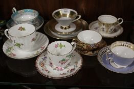 A QUANTITY OF CHINA CABINET CUPS AND SAUCERS ETC TO INC COALPORT ETC
