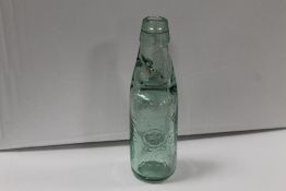 A VINTAGE GREEN GLASS DRINKS BOTTLE ADVERTISING HARDMAN AND OPENSHAW OF STAFFORD