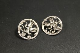 A PAIR OF ART NOUVEAU HALLMARKED SILVER BUTTONS ADAPTED AS EARRINGS