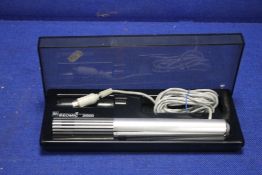 A BANG AND OLUFSEN BEOMIC 2000 MICROPHONE IN A FITTED CASE