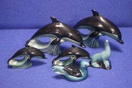 A COLLECTION OF POOLE ANIMALS TO INCLUDE DOLPHINS 1 A/F, A DUCK AND A SEALIONconditionreport:ONE