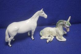 A BESWICK LUSITANO HORSE TOGETHER WITH A BASIL MATTHEWS HORSE