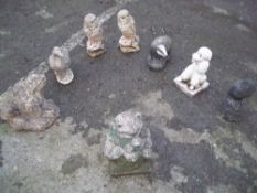 A SELECTION OF 8 GARDEN STATUES