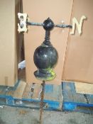 AN ANTIQUE WOOD AND STEEL WEATHER VANE