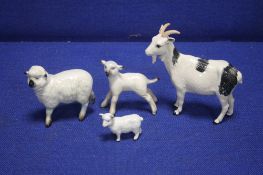 A BESWICK GOAT TOGETHER WITH A BESWICK SHEEP AND A LAMB