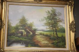 A GILT FRAMED OIL ON CANVAS OF A COUNTRYSIDE SCENE 64 CM X 69 CM