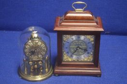 A KUNDO DOME CLOCK TOGETHER WITH A MANTLE CLOCK